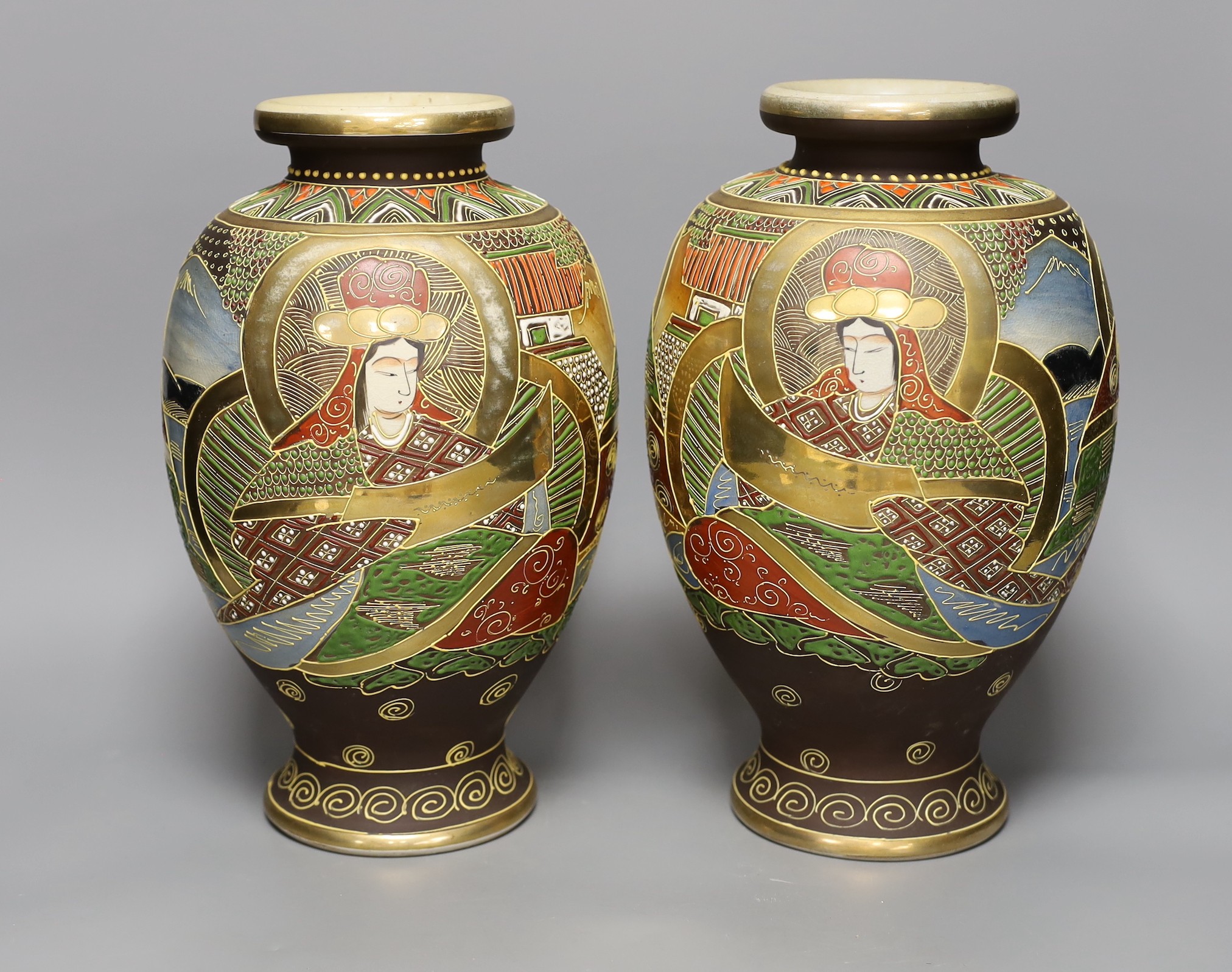 A pair of Satsuma vases, 31cm tall